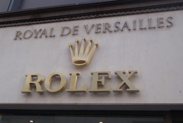 Building front logo signage at Rolex